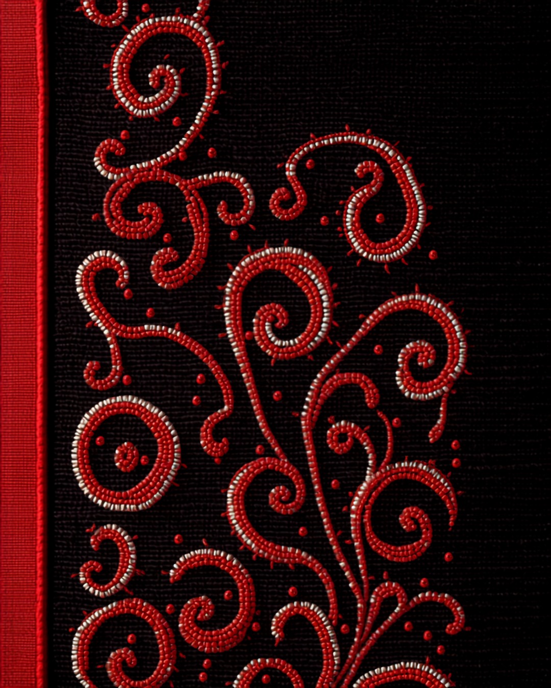 Macro of red and white curving beadwork on a black ground